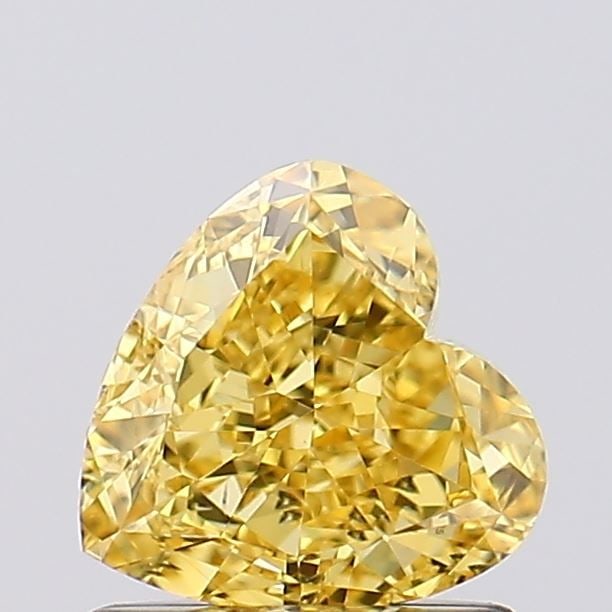 Loose Diamond - HEART 1.03ct Fancy Vivid Yellow VS2: Loose Diamond - HEART 1.03ct Fancy Vivid Yellow VS2 Source: This is a real non-mined Diamond that has been grown in a lab Shape: HEART Carats: 1.03 Color: Fancy Vivid Yellow Certification: IGI Video:
