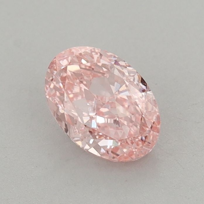 Loose Diamond - OVAL 0.7ct Fancy Vivid Pink VS1: Loose Diamond - OVAL 0.7ct Fancy Vivid Pink VS1 Source: This is a real non-mined Diamond that has been grown in a lab Shape: OVAL Carats: 0.7 Color: Fancy Vivid Pink Certification: IGI Video: