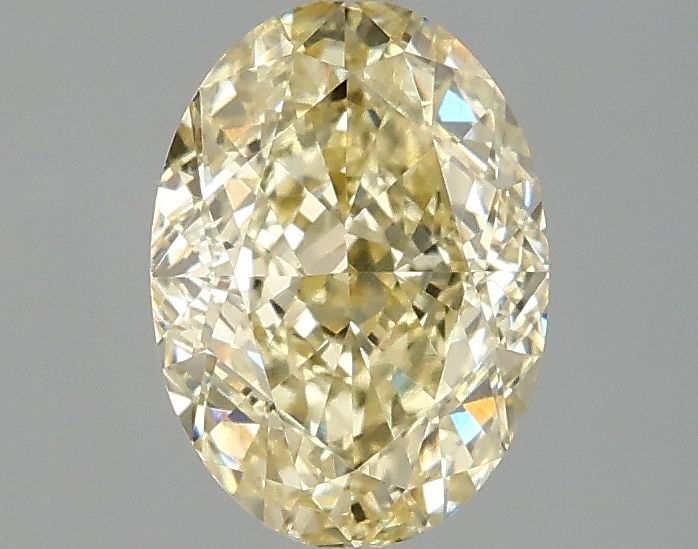 Loose Diamond - OVAL 1.58ct Fancy Yellow VS1: Loose Diamond - OVAL 1.58ct Fancy Yellow VS1 Source: This is a real non-mined Diamond that has been grown in a lab Shape: OVAL Carats: 1.58 Color: Fancy Yellow Certification: IGI Video: