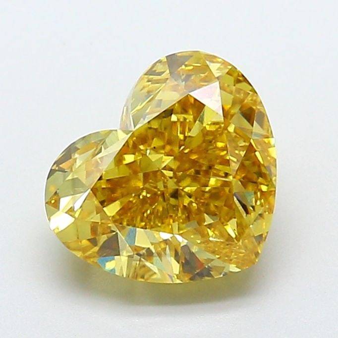 Loose Diamond - HEART 4.17ct Fancy Vivid Yellow VS2: Loose Diamond - HEART 4.17ct Fancy Vivid Yellow VS2 Source: This is a real non-mined Diamond that has been grown in a lab Shape: HEART Carats: 4.17 Color: Fancy Vivid Yellow Certification: IGI Video: