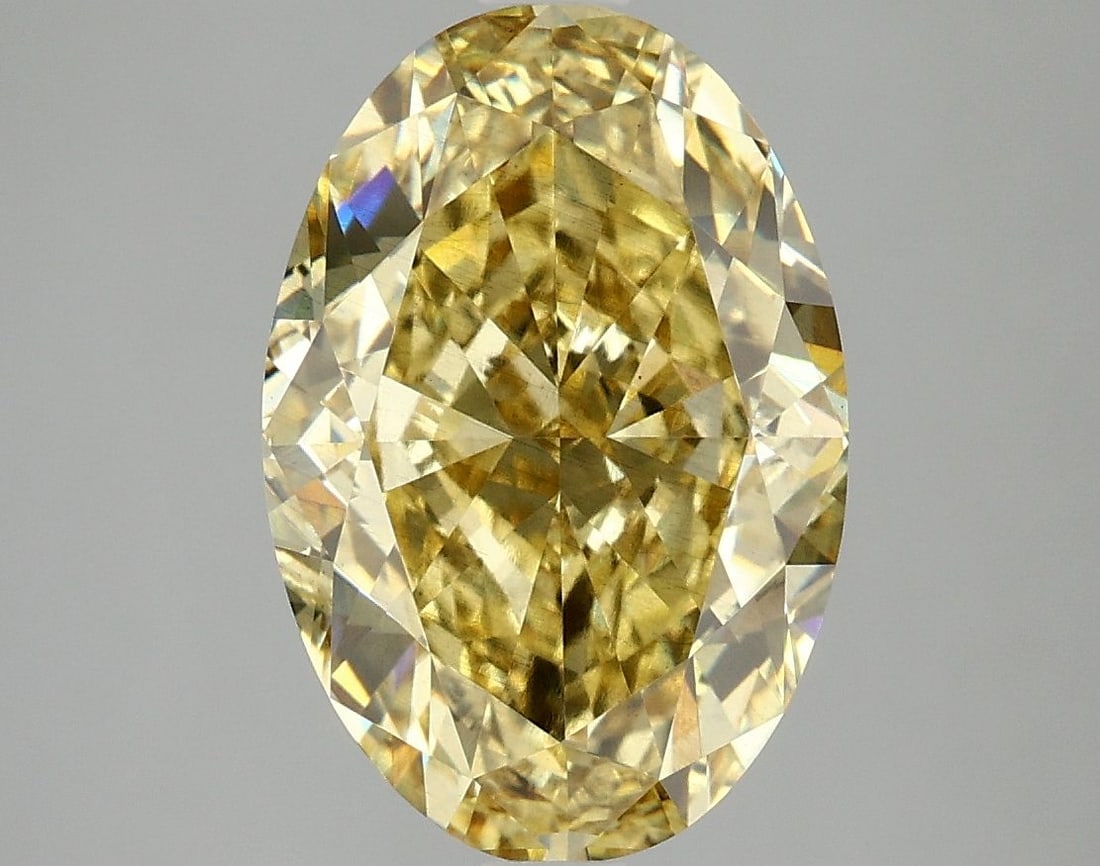 Loose Diamond - OVAL 5.06ct Fancy Vivid Yellow SI1: Loose Diamond - OVAL 5.06ct Fancy Vivid Yellow SI1 Source: This is a real non-mined Diamond that has been grown in a lab Shape: OVAL Carats: 5.06 Color: Fancy Vivid Yellow Certification: IGI Video: