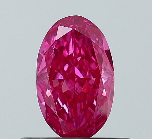 Loose Diamond - OVAL 0.54ct Fancy Vivid Pink VS1: Loose Diamond - OVAL 0.54ct Fancy Vivid Pink VS1 Source: This is a real non-mined Diamond that has been grown in a lab Shape: OVAL Carats: 0.54 Color: Fancy Vivid Pink Certification: NONE Video: