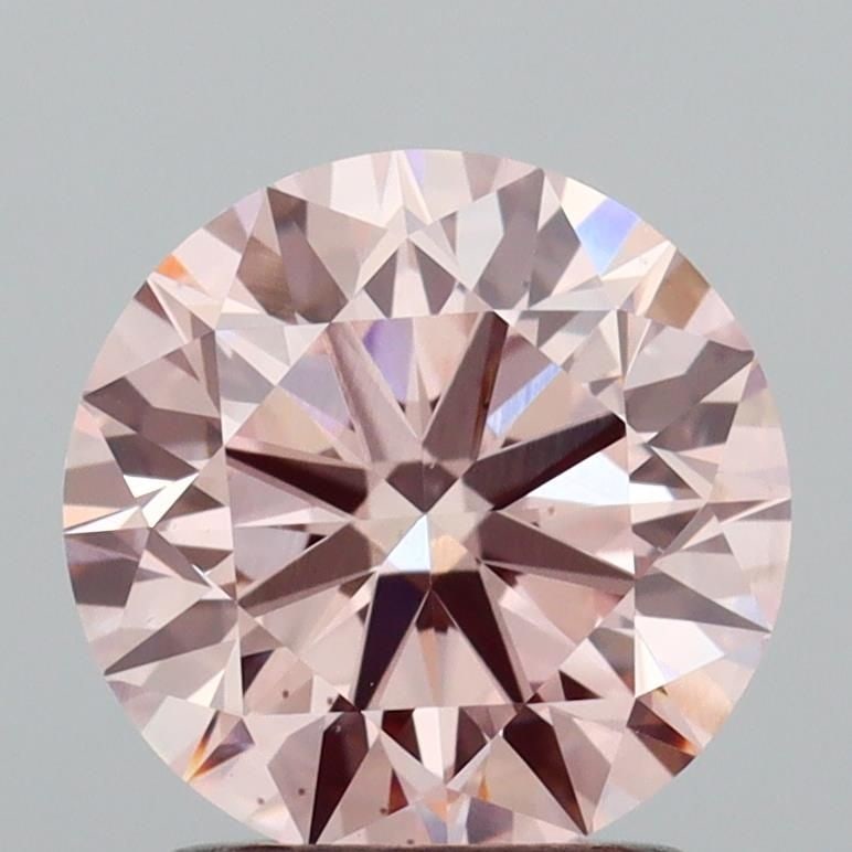Ideal Loose Diamond - ROUND 1.61ct Fancy Pink VS2: Ideal Loose Diamond - ROUND 1.61ct Fancy Pink VS2 Source: This is a real non-mined Diamond that has been grown in a lab Shape: ROUND Carats: 1.61 Color: Fancy Pink Certification: IGI Video:
