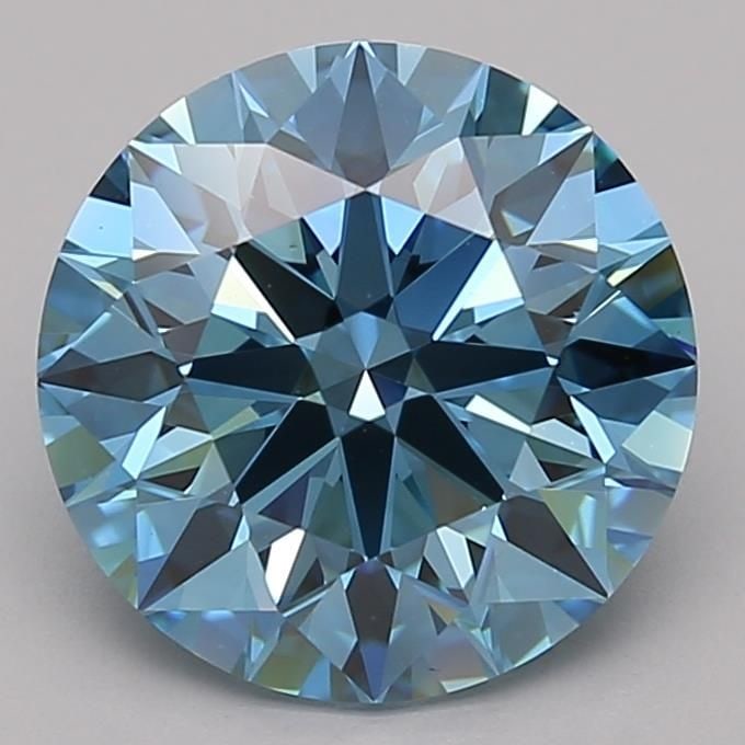 Ideal Loose Diamond - ROUND 3.21ct Fancy Vivid Blue VS1: Ideal Loose Diamond - ROUND 3.21ct Fancy Vivid Blue VS1 Source: This is a real non-mined Diamond that has been grown in a lab Shape: ROUND Carats: 3.21 Color: Fancy Vivid Blue Certification: IGI Video