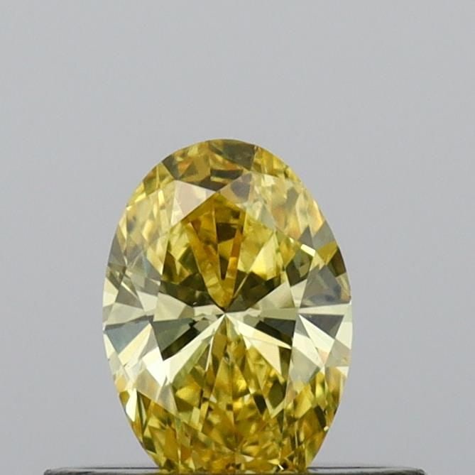 Loose Diamond - OVAL 0.33ct Fancy Vivid Yellow VS2: Loose Diamond - OVAL 0.33ct Fancy Vivid Yellow VS2 Source: This is a real non-mined Diamond that has been grown in a lab Shape: OVAL Carats: 0.33 Color: Fancy Vivid Yellow Certification: IGI Video: