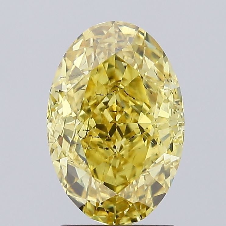 Loose Diamond - OVAL 2.21ct Fancy Vivid Yellow SI1: Loose Diamond - OVAL 2.21ct Fancy Vivid Yellow SI1 Source: This is a real non-mined Diamond that has been grown in a lab Shape: OVAL Carats: 2.21 Color: Fancy Vivid Yellow Certification: IGI Video: