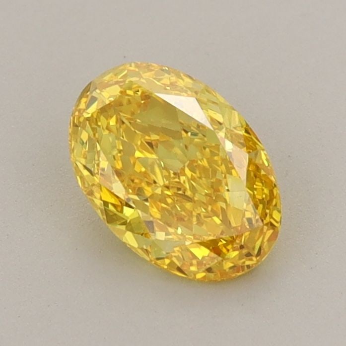 Loose Diamond - OVAL 0.73ct Fancy Vivid Yellow VS1: Loose Diamond - OVAL 0.73ct Fancy Vivid Yellow VS1 Source: This is a real non-mined Diamond that has been grown in a lab Shape: OVAL Carats: 0.73 Color: Fancy Vivid Yellow Certification: IGI Video: