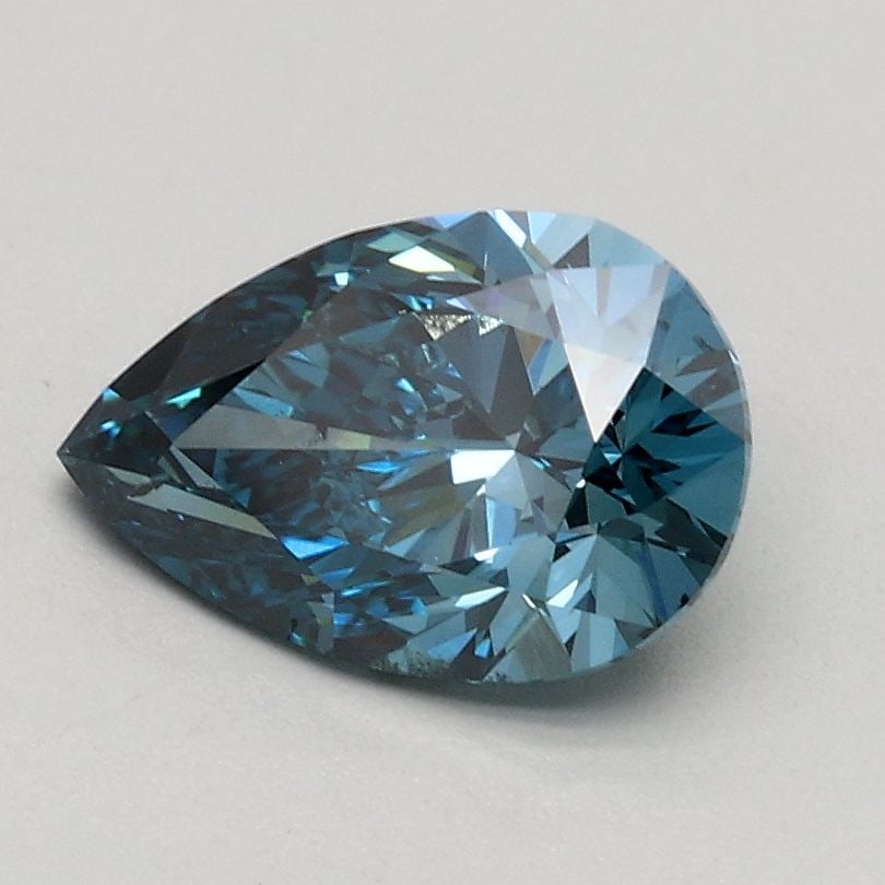 Loose Diamond - PEAR 0.9ct Fancy Vivid Blue SI1: Loose Diamond - PEAR 0.9ct Fancy Vivid Blue SI1 Source: This is a real non-mined Diamond that has been grown in a lab Shape: PEAR Carats: 0.9 Color: Fancy Vivid Blue Certification: IGI Video: