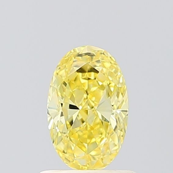 Loose Diamond - OVAL 0.9ct Fancy Vivid Yellow VVS2: Loose Diamond - OVAL 0.9ct Fancy Vivid Yellow VVS2 Source: This is a real non-mined Diamond that has been grown in a lab Shape: OVAL Carats: 0.9 Color: Fancy Vivid Yellow Certification: IGI Video: