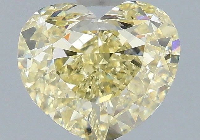 Loose Diamond - HEART 2.08ct Fancy Yellow VS1: Loose Diamond - HEART 2.08ct Fancy Yellow VS1 Source: This is a real non-mined Diamond that has been grown in a lab Shape: HEART Carats: 2.08 Color: Fancy Yellow Certification: IGI Video: Video Link