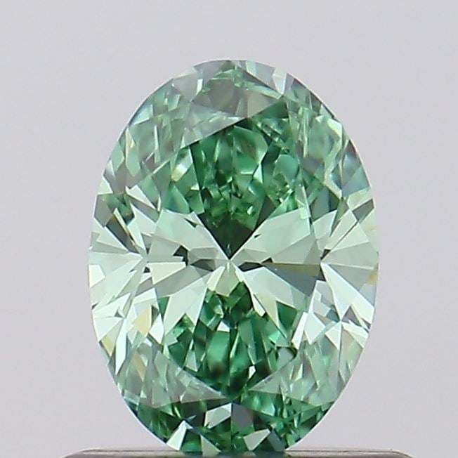 Loose Diamond - OVAL 0.56ct Fancy Vivid Green VVS2: Loose Diamond - OVAL 0.56ct Fancy Vivid Green VVS2 Source: This is a real non-mined Diamond that has been grown in a lab Shape: OVAL Carats: 0.56 Color: Fancy Vivid Green Certification: IGI Video: