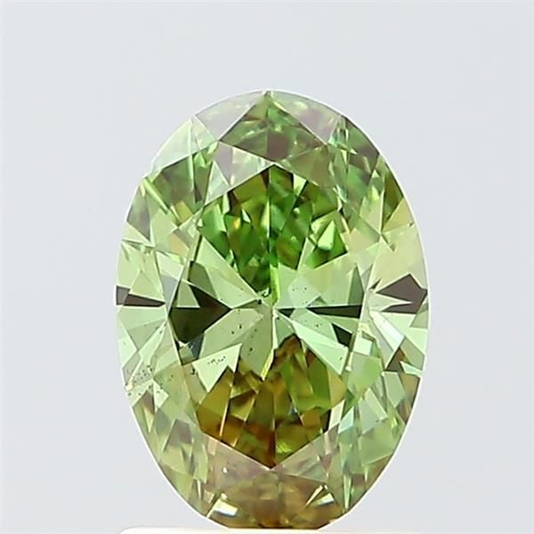 Loose Diamond - OVAL 0.94ct Fancy Vivid Green VS2: Loose Diamond - OVAL 0.94ct Fancy Vivid Green VS2 Source: This is a real non-mined Diamond that has been grown in a lab Shape: OVAL Carats: 0.94 Color: Fancy Vivid Green Certification: IGI Video: