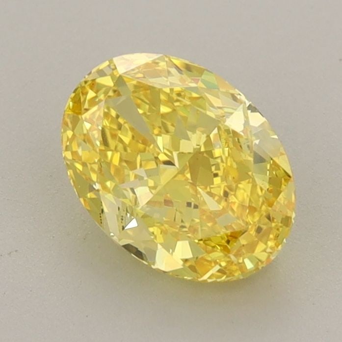 Loose Diamond - OVAL 1.22ct Fancy Vivid Yellow VS1: Loose Diamond - OVAL 1.22ct Fancy Vivid Yellow VS1 Source: This is a real non-mined Diamond that has been grown in a lab Shape: OVAL Carats: 1.22 Color: Fancy Vivid Yellow Certification: IGI Video: