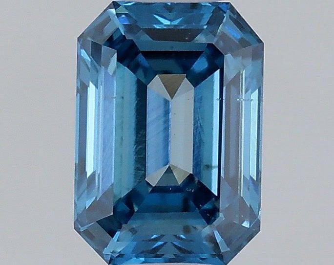 Loose Diamond - EMERALD 0.42ct Fancy Vivid Blue VS2: Loose Diamond - EMERALD 0.42ct Fancy Vivid Blue VS2 Source: This is a real non-mined Diamond that has been grown in a lab Shape: EMERALD Carats: 0.42 Color: Fancy Vivid Blue Certification: IGI Video: