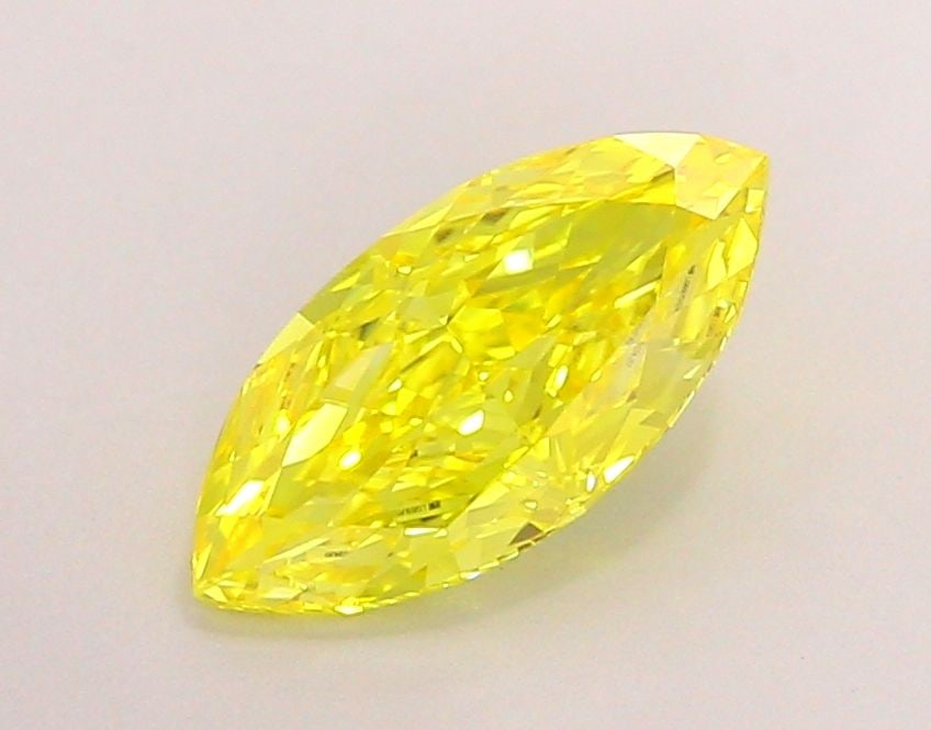 Loose Diamond - MARQUISE 1.41ct Fancy Vivid Yellow VVS1: Loose Diamond - MARQUISE 1.41ct Fancy Vivid Yellow VVS1 Source: This is a real non-mined Diamond that has been grown in a lab Shape: MARQUISE Carats: 1.41 Color: Fancy Vivid Yellow Certification: IGI 
