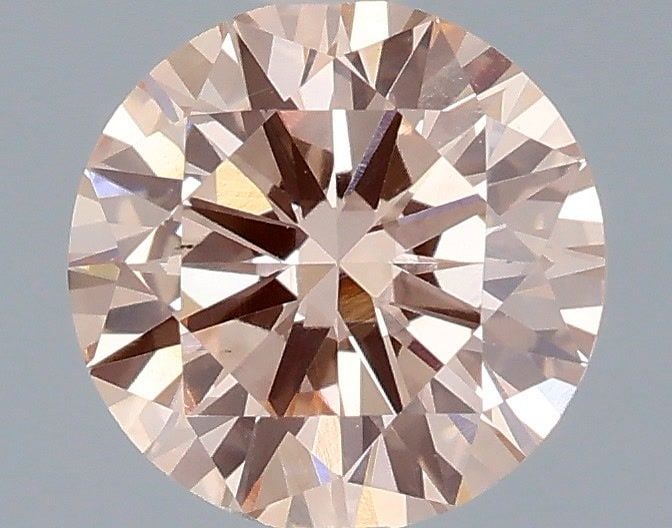 Loose Diamond - ROUND 0.72ct Fancy Intense Pink VS1: Loose Diamond - ROUND 0.72ct Fancy Intense Pink VS1 Source: This is a real non-mined Diamond that has been grown in a lab Shape: ROUND Carats: 0.72 Color: Fancy Intense Pink Certification: IGI Video: