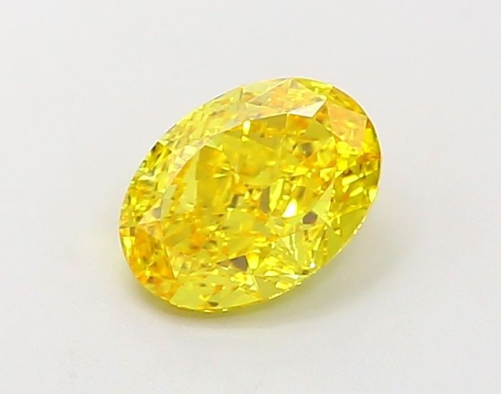 Loose Diamond - OVAL 1.05ct Fancy Vivid Yellow VVS2: Loose Diamond - OVAL 1.05ct Fancy Vivid Yellow VVS2 Source: This is a real non-mined Diamond that has been grown in a lab Shape: OVAL Carats: 1.05 Color: Fancy Vivid Yellow Certification: IGI Video: