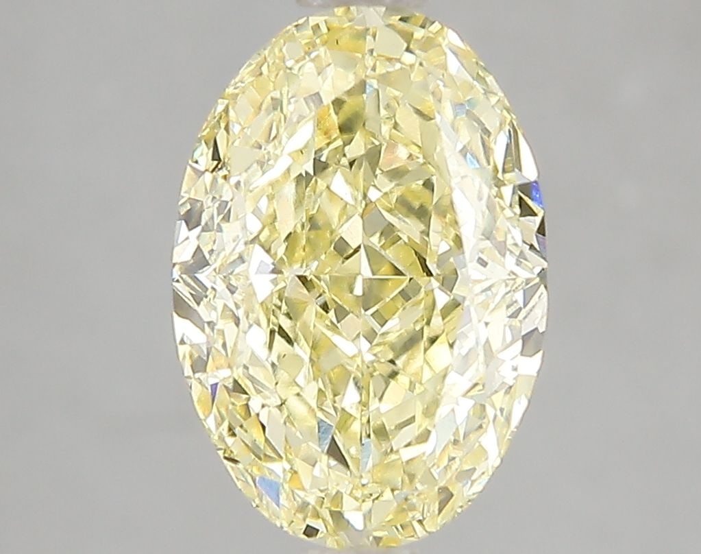 Loose Diamond - OVAL 3.1ct Fancy Vivid Yellow VS1: Loose Diamond - OVAL 3.1ct Fancy Vivid Yellow VS1 Source: This is a real non-mined Diamond that has been grown in a lab Shape: OVAL Carats: 3.1 Color: Fancy Vivid Yellow Certification: IGI Video: