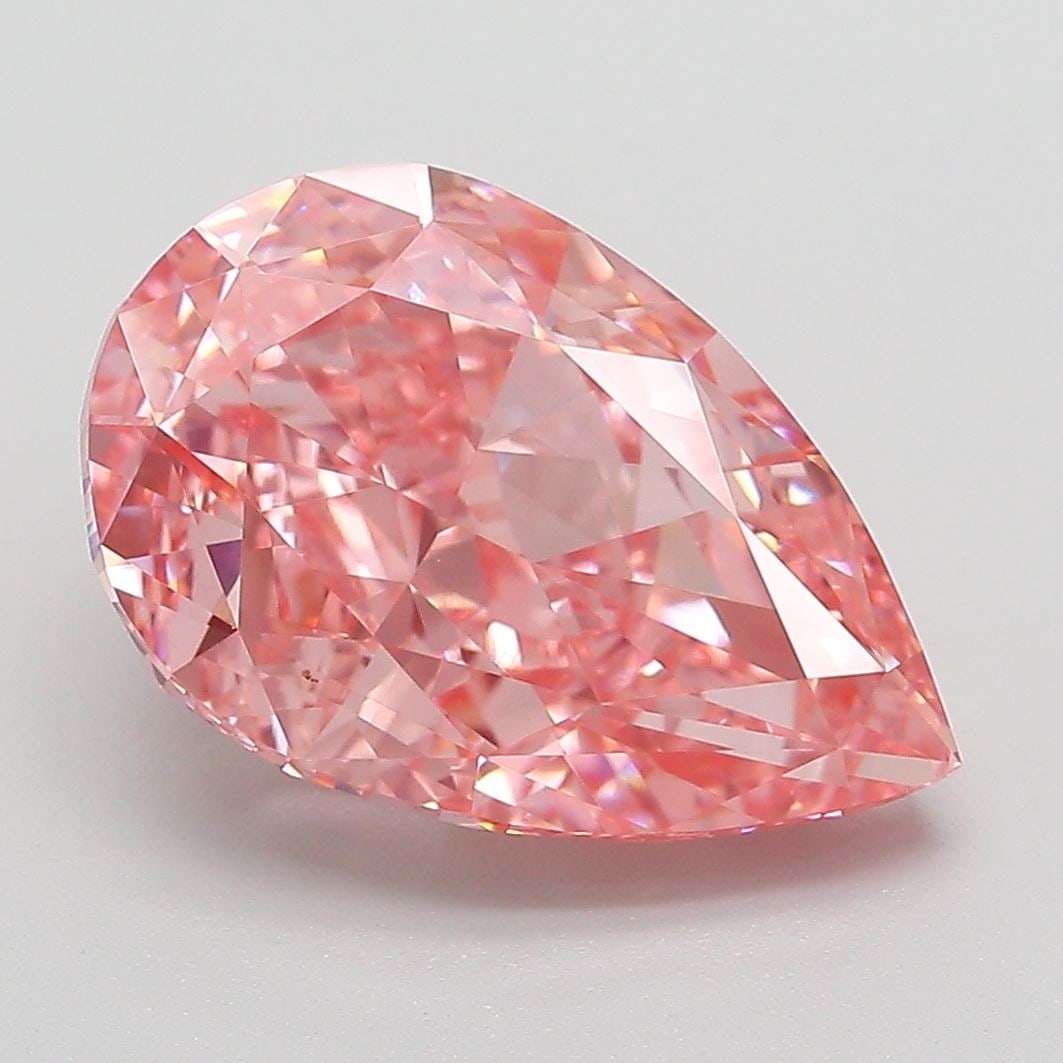 Loose Diamond - PEAR 5.06ct Fancy Vivid Pink VVS2: Loose Diamond - PEAR 5.06ct Fancy Vivid Pink VVS2 Source: This is a real non-mined Diamond that has been grown in a lab Shape: PEAR Carats: 5.06 Color: Fancy Vivid Pink Certification: IGI Video:
