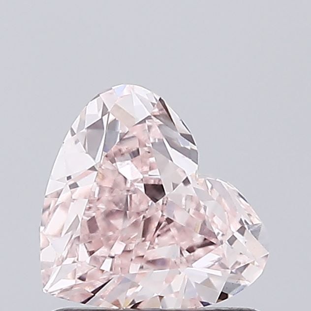 Loose Diamond - HEART 0.94ct Fancy Pink VS1: Loose Diamond - HEART 0.94ct Fancy Pink VS1 Source: This is a real non-mined Diamond that has been grown in a lab Shape: HEART Carats: 0.94 Color: Fancy Pink Certification: IGI Video: