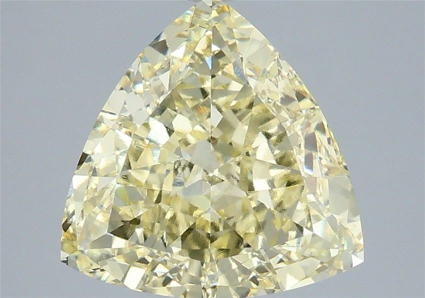 Loose Diamond - TRIANGULAR 4.07ct Fancy Yellow VS1: Loose Diamond - TRIANGULAR 4.07ct Fancy Yellow VS1 Source: This is a real non-mined Diamond that has been grown in a lab Shape: TRIANGULAR Carats: 4.07 Color: Fancy Yellow Certification: IGI Video: