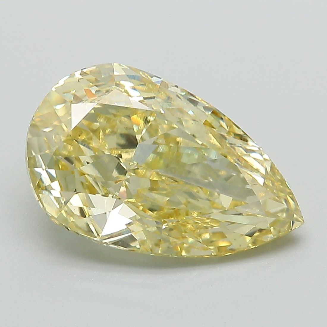 Loose Diamond - PEAR 4.23ct Fancy Vivid Yellow VS1: Loose Diamond - PEAR 4.23ct Fancy Vivid Yellow VS1 Source: This is a real non-mined Diamond that has been grown in a lab Shape: PEAR Carats: 4.23 Color: Fancy Vivid Yellow Certification: IGI Video: