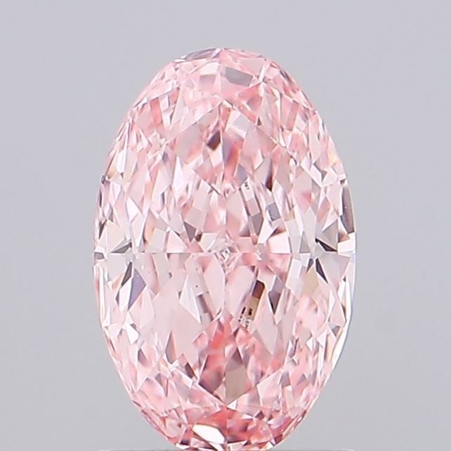 Loose Diamond - OVAL 1.16ct Fancy Vivid Pink VVS2: Loose Diamond - OVAL 1.16ct Fancy Vivid Pink VVS2 Source: This is a real non-mined Diamond that has been grown in a lab Shape: OVAL Carats: 1.16 Color: Fancy Vivid Pink Certification: IGI The Diamond 
