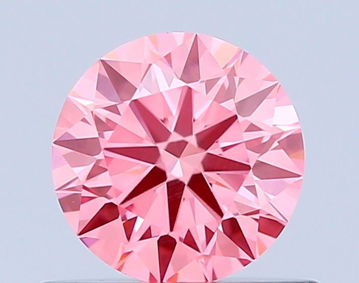 Loose Diamond - ROUND 0.55ct Fancy Vivid Pink VVS1: Loose Diamond - ROUND 0.55ct Fancy Vivid Pink VVS1 Source: This is a real non-mined Diamond that has been grown in a lab Shape: ROUND Carats: 0.55 Color: Fancy Vivid Pink Certification: IGI Video:
