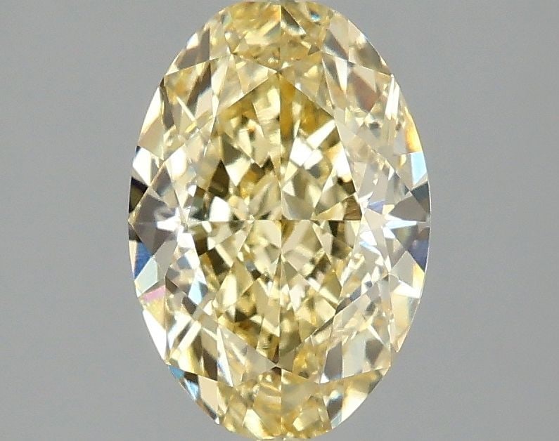 Loose Diamond - OVAL 2.09ct Fancy Intense Yellow VVS2: Loose Diamond - OVAL 2.09ct Fancy Intense Yellow VVS2 Source: This is a real non-mined Diamond that has been grown in a lab Shape: OVAL Carats: 2.09 Color: Fancy Intense Yellow Certification: IGI Vide