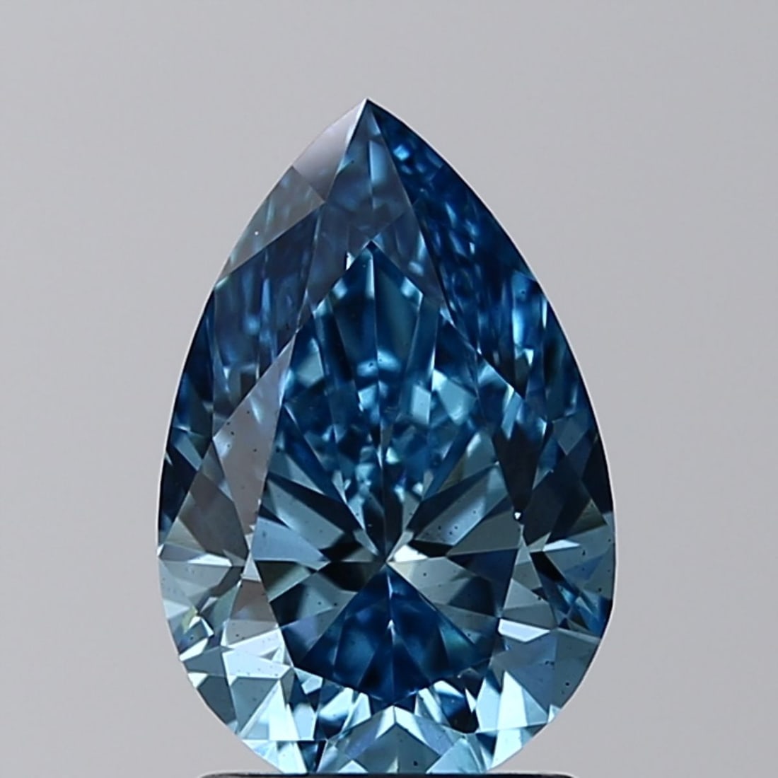 Loose Diamond - PEAR 1.7ct Fancy Vivid Blue SI1: Loose Diamond - PEAR 1.7ct Fancy Vivid Blue SI1 Source: This is a real non-mined Diamond that has been grown in a lab Shape: PEAR Carats: 1.7 Color: Fancy Vivid Blue Certification: IGI Video: