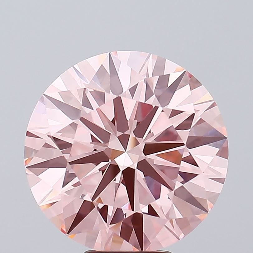 Ideal Loose Diamond - ROUND 8.7ct Fancy Vivid Pink VVS2: Ideal Loose Diamond - ROUND 8.7ct Fancy Vivid Pink VVS2 Source: This is a real non-mined Diamond that has been grown in a lab Shape: ROUND Carats: 8.7 Color: Fancy Vivid Pink Certification: IGI Video: