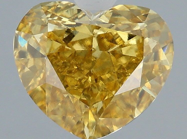 Loose Diamond - HEART 3.02ct Fancy Vivid Yellow VS2: Loose Diamond - HEART 3.02ct Fancy Vivid Yellow VS2 Source: This is a real non-mined Diamond that has been grown in a lab Shape: HEART Carats: 3.02 Color: Fancy Vivid Yellow Certification: IGI Video:
