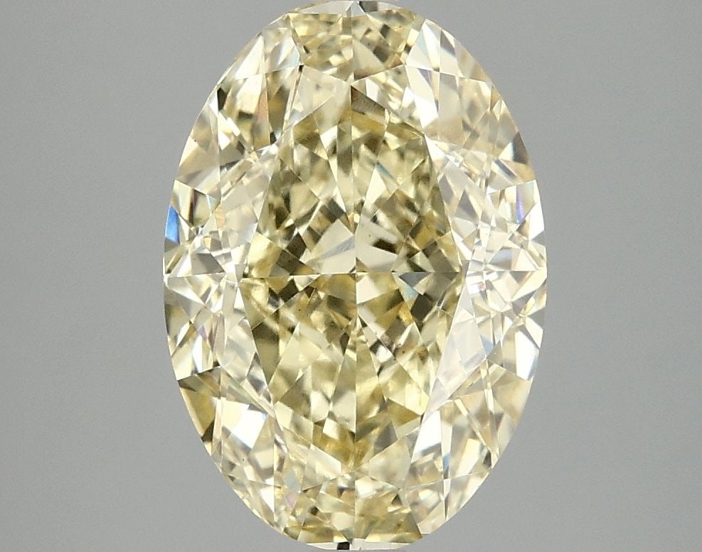 Loose Diamond - OVAL 4.1ct Fancy Intense Yellow VS1: Loose Diamond - OVAL 4.1ct Fancy Intense Yellow VS1 Source: This is a real non-mined Diamond that has been grown in a lab Shape: OVAL Carats: 4.1 Color: Fancy Intense Yellow Certification: IGI Video: