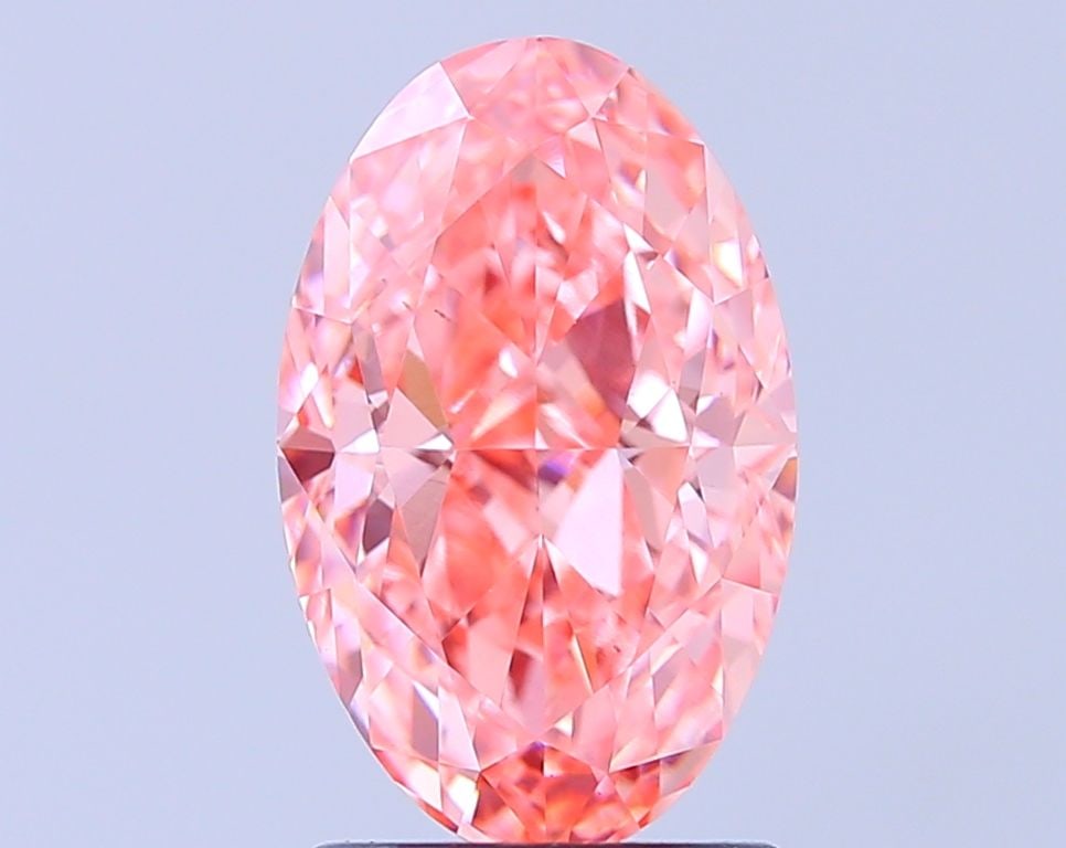 Loose Diamond - OVAL 2.57ct Fancy Vivid Pink VS1: Loose Diamond - OVAL 2.57ct Fancy Vivid Pink VS1 Source: This is a real non-mined Diamond that has been grown in a lab Shape: OVAL Carats: 2.57 Color: Fancy Vivid Pink Certification: IGI Video: