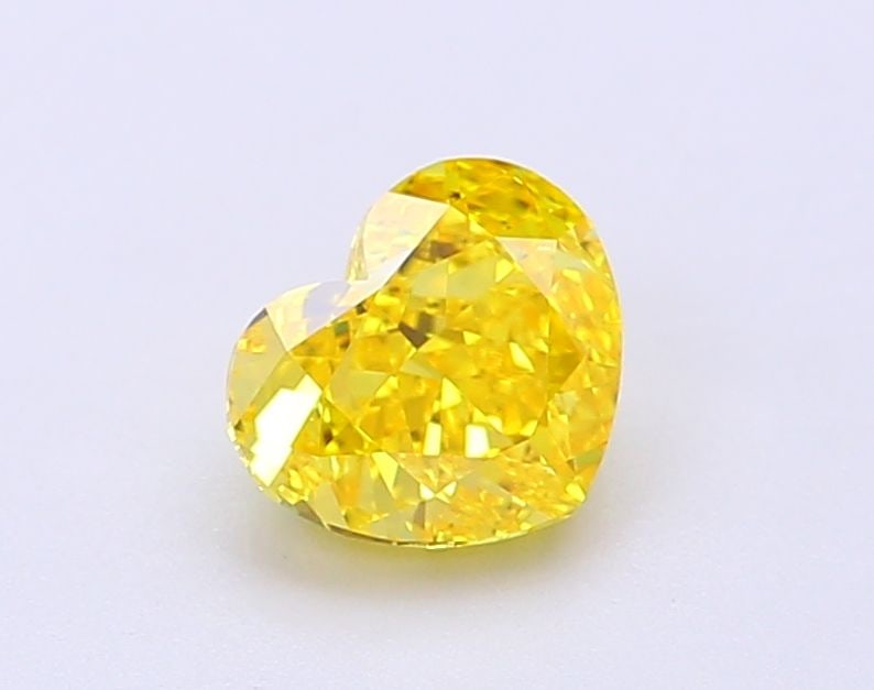 Loose Diamond - HEART 1.09ct Fancy Vivid Yellow VS1: Loose Diamond - HEART 1.09ct Fancy Vivid Yellow VS1 Source: This is a real non-mined Diamond that has been grown in a lab Shape: HEART Carats: 1.09 Color: Fancy Vivid Yellow Certification: IGI Video: