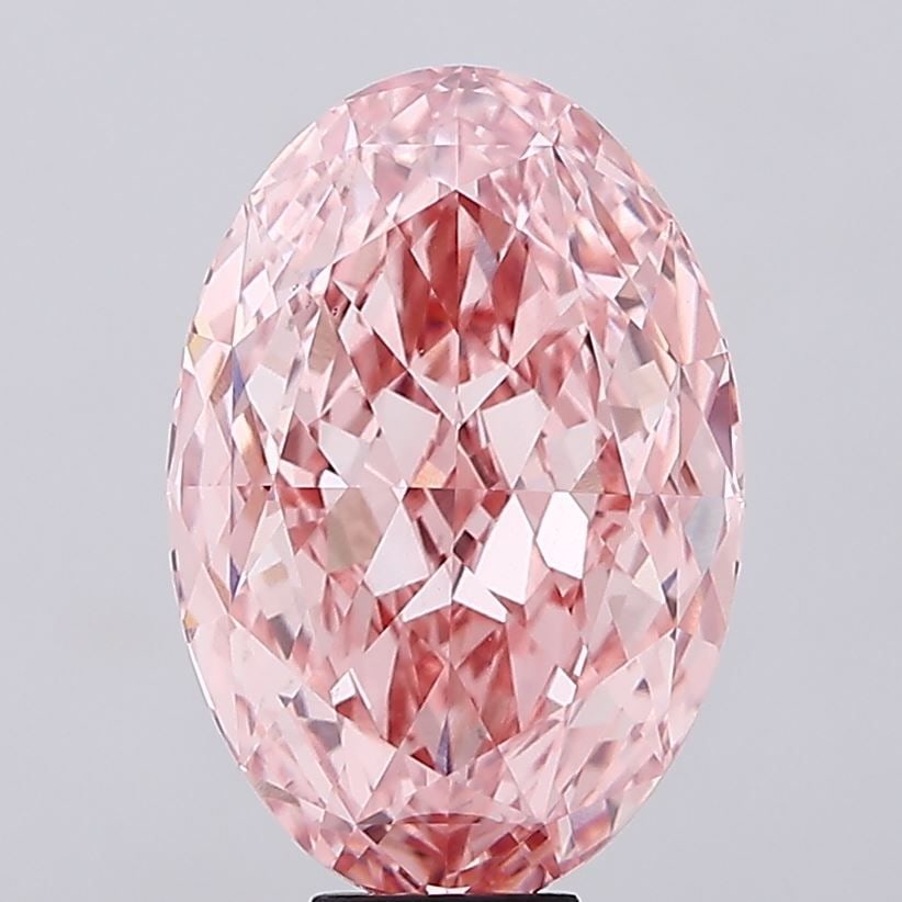 Loose Diamond - OVAL 14.61ct Fancy Vivid Pink VS1: Loose Diamond - OVAL 14.61ct Fancy Vivid Pink VS1 Source: This is a real non-mined Diamond that has been grown in a lab Shape: OVAL Carats: 14.61 Color: Fancy Vivid Pink Certification: IGI Video: