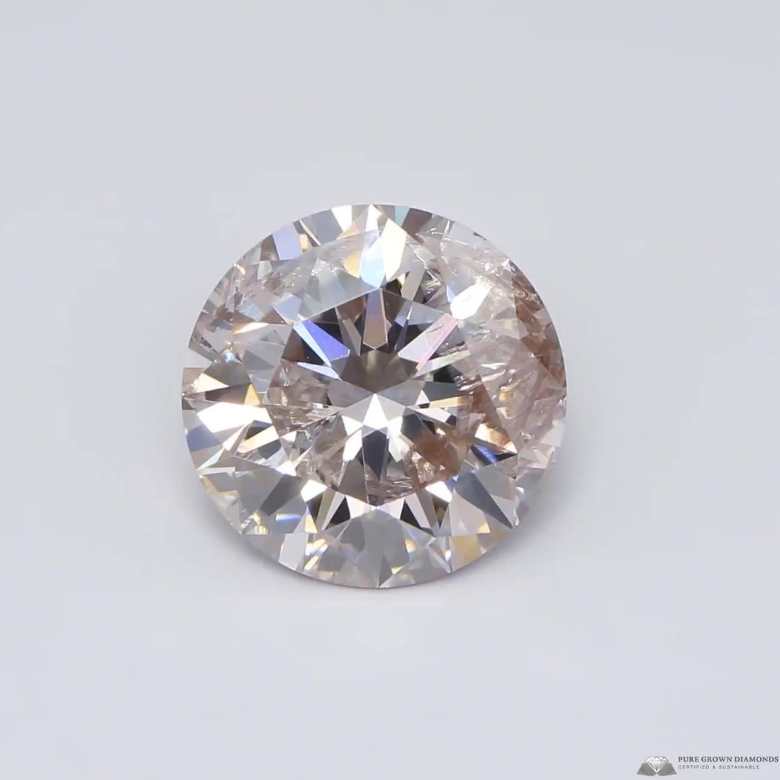 Loose Diamond - ROUND 1.87ct K FAINT BROWN I1: Loose Diamond - ROUND 1.87ct K FAINT BROWN I1 Source: This is a real non-mined Diamond that has been grown in a lab Shape: ROUND Carats: 1.87 Color: K FAINT BROWN Certification: IGI Video: