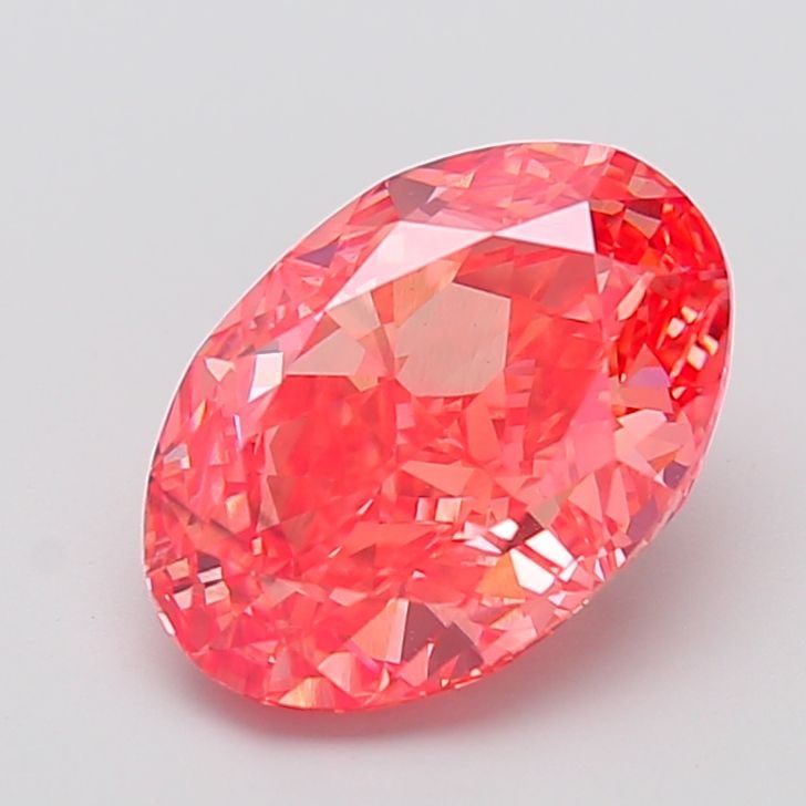 Loose Diamond - OVAL 5.0ct Fancy Vivid Orangey Pink SI1: Loose Diamond - OVAL 5.0ct Fancy Vivid Orangey Pink SI1 Source: This is a real non-mined Diamond that has been grown in a lab Shape: OVAL Carats: 5.0 Color: Fancy Vivid Orangey Pink Certification: IGI