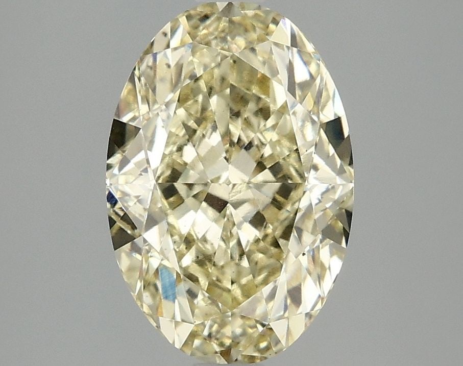 Loose Diamond - OVAL 3.04ct Fancy Intense Yellow VS2: Loose Diamond - OVAL 3.04ct Fancy Intense Yellow VS2 Source: This is a real non-mined Diamond that has been grown in a lab Shape: OVAL Carats: 3.04 Color: Fancy Intense Yellow Certification: IGI Video