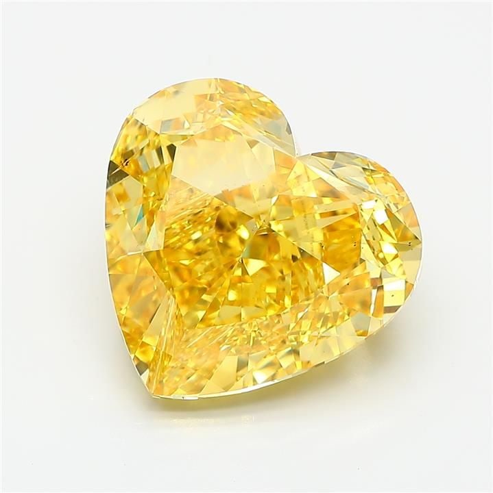 Loose Diamond - HEART 10.54ct Fancy Vivid Yellow VS1: Loose Diamond - HEART 10.54ct Fancy Vivid Yellow VS1 Source: This is a real non-mined Diamond that has been grown in a lab Shape: HEART Carats: 10.54 Color: Fancy Vivid Yellow Certification: IGI Video