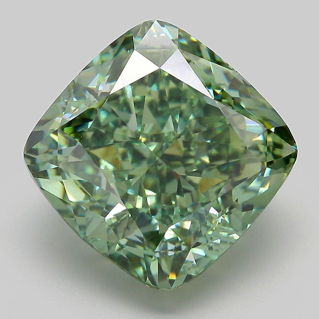 Loose Diamond - CUSHION MODIFIED 12.1ct Fancy Vivid Green VVS2: Loose Diamond - CUSHION MODIFIED 12.1ct Fancy Vivid Green VVS2 Source: This is a real non-mined Diamond that has been grown in a lab Shape: CUSHION MODIFIED Carats: 12.1 Color: Fancy Vivid Green Certi