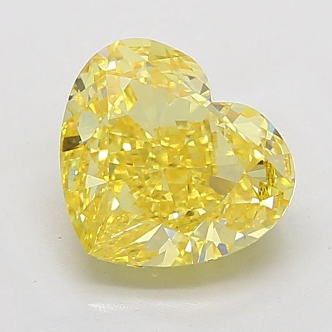 Loose Diamond - HEART 5.06ct Fancy Vivid Yellow VS2: Loose Diamond - HEART 5.06ct Fancy Vivid Yellow VS2 Source: This is a real non-mined Diamond that has been grown in a lab Shape: HEART Carats: 5.06 Color: Fancy Vivid Yellow Certification: IGI Video: