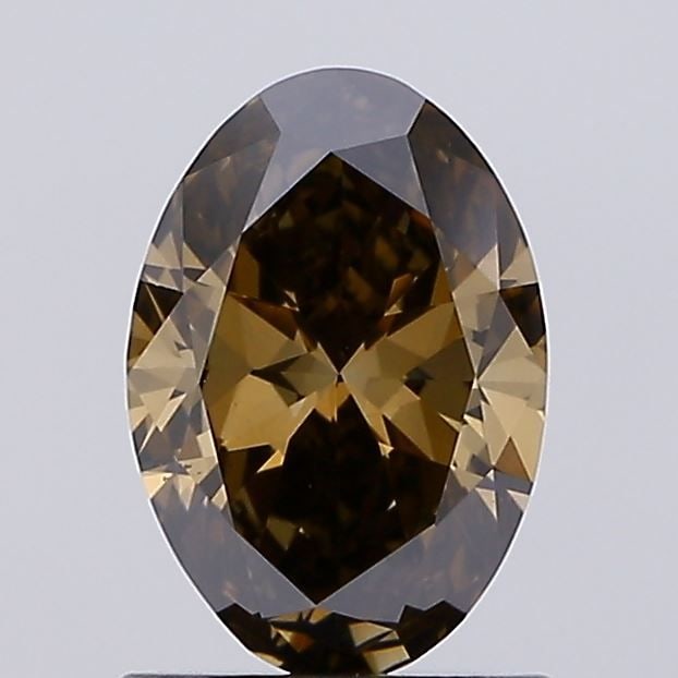 Loose Diamond - OVAL 1.04ct Fancy Brown VS1: Loose Diamond - OVAL 1.04ct Fancy Brown VS1 Source: This is a real non-mined Diamond that has been grown in a lab Shape: OVAL Carats: 1.04 Color: Fancy Brown Certification: IGI Video: