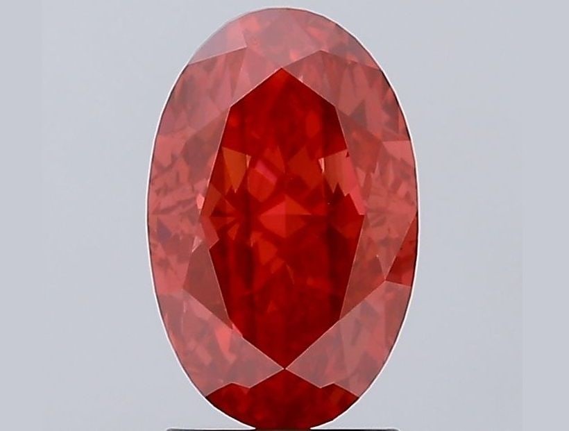 Loose Diamond - OVAL 3.1ct Fancy Vivid Red SI1: Loose Diamond - OVAL 3.1ct Fancy Vivid Red SI1 Source: This is a real non-mined Diamond that has been grown in a lab Shape: OVAL Carats: 3.1 Color: Fancy Vivid Red Certification: IGI Video: