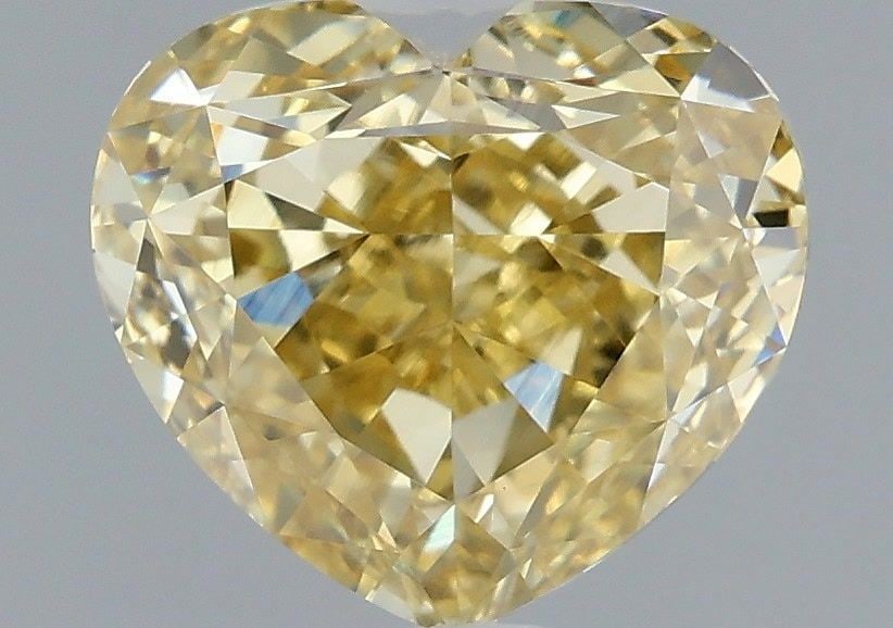 Loose Diamond - HEART 1.52ct Fancy Yellow VS1: Loose Diamond - HEART 1.52ct Fancy Yellow VS1 Source: This is a real non-mined Diamond that has been grown in a lab Shape: HEART Carats: 1.52 Color: Fancy Yellow Certification: IGI Video: