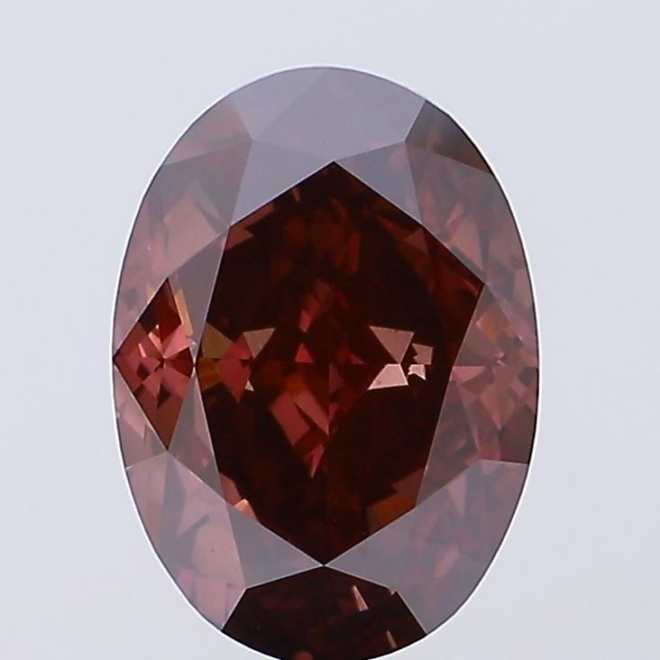 Loose Diamond - OVAL 7.0ct Fancy Deep Brownish Pink VS1: Loose Diamond - OVAL 7.0ct Fancy Deep Brownish Pink VS1 Source: This is a real non-mined Diamond that has been grown in a lab Shape: OVAL Carats: 7.0 Color: Fancy Deep Brownish Pink Certification: IGI