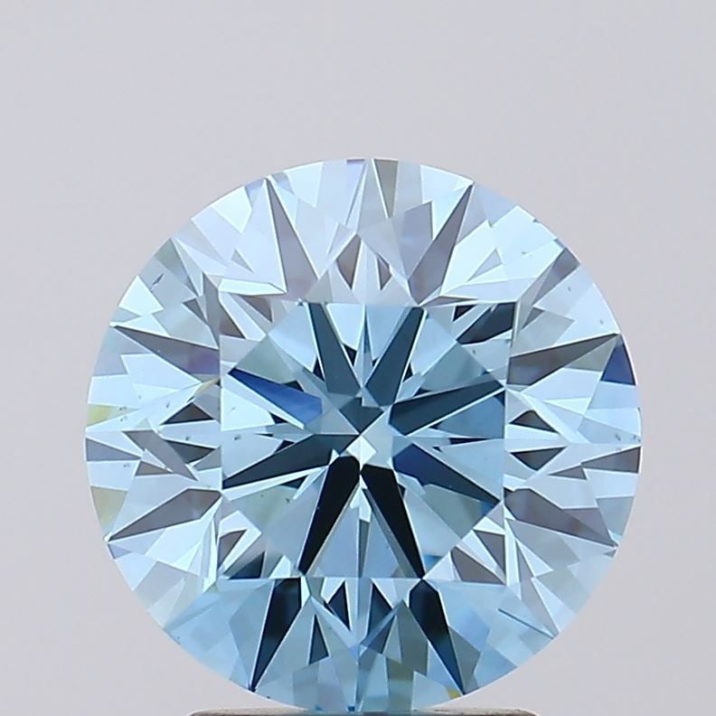 Ideal Loose Diamond - ROUND 3.0ct Fancy Vivid Blue VS1: Ideal Loose Diamond - ROUND 3.0ct Fancy Vivid Blue VS1 Source: This is a real non-mined Diamond that has been grown in a lab Shape: ROUND Carats: 3.0 Color: Fancy Vivid Blue Certification: IGI Video: