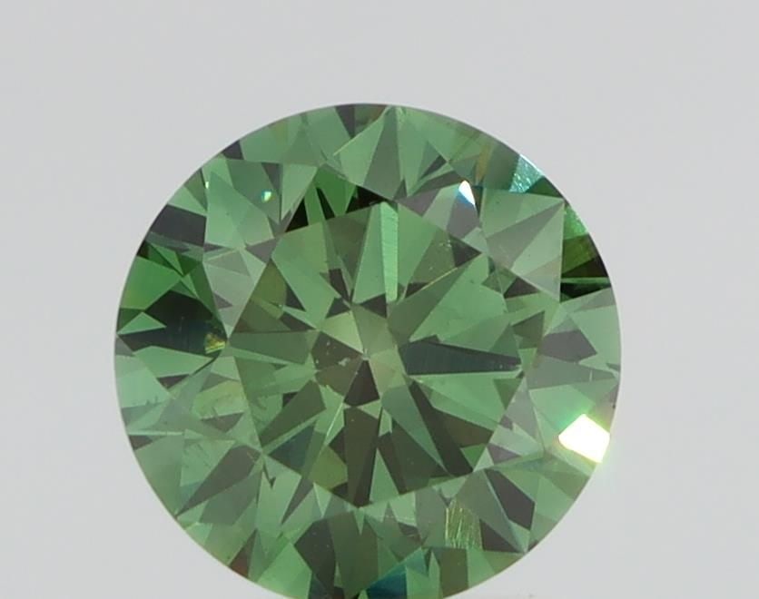 Loose Diamond - ROUND 1.69ct Fancy Green VS2: Loose Diamond - ROUND 1.69ct Fancy Green VS2 Source: This is a real non-mined Diamond that has been grown in a lab Shape: ROUND Carats: 1.69 Color: Fancy Green Certification: NONE Video: