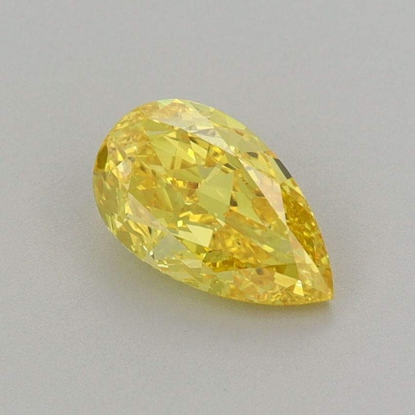 Loose Diamond - PEAR 1.0ct Fancy Vivid Yellow VS1: Loose Diamond - PEAR 1.0ct Fancy Vivid Yellow VS1 Source: This is a real non-mined Diamond that has been grown in a lab Shape: PEAR Carats: 1.0 Color: Fancy Vivid Yellow Certification: IGI Video: