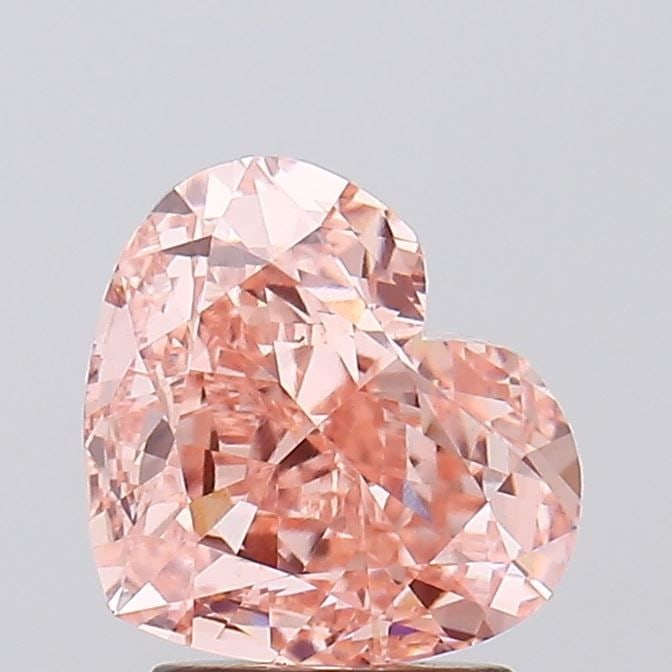 Loose Diamond - HEART 2.74ct Fancy Vivid Pink VVS2: Loose Diamond - HEART 2.74ct Fancy Vivid Pink VVS2 Source: This is a real non-mined Diamond that has been grown in a lab Shape: HEART Carats: 2.74 Color: Fancy Vivid Pink Certification: IGI Video: